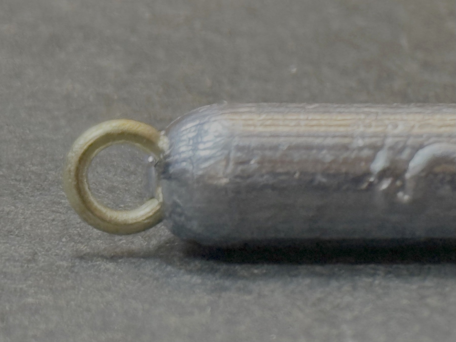Heavy-duty brass eyelet on ForgeCast pencil weight